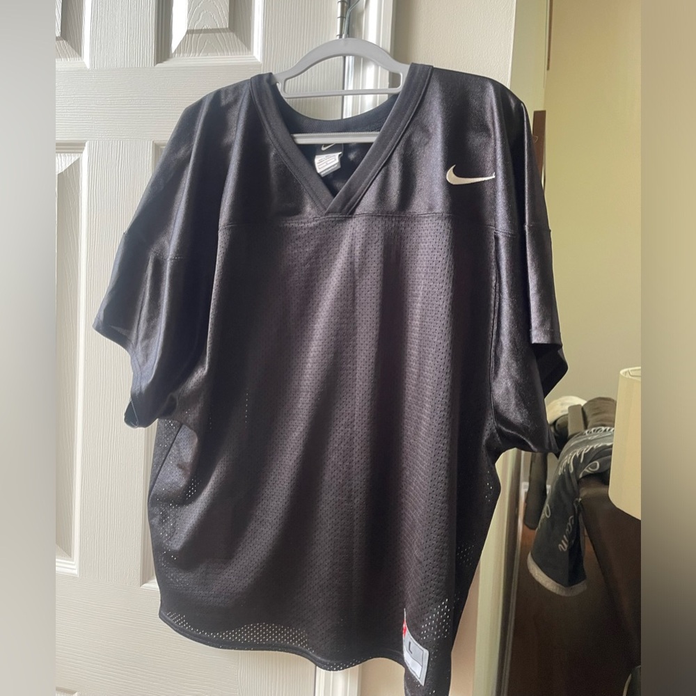 Nike black mesh football practice jersey.  Size youth Large